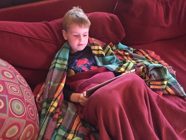 Sick kid watches Charlie Brown
