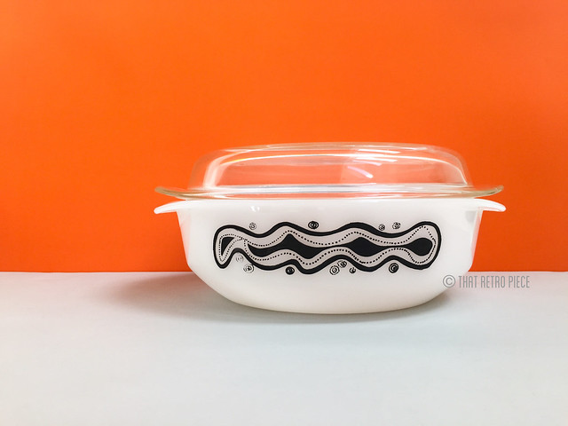 Added this uber cool dish to my personal collection this week...  It's an Agee/Crown Pyrex piece called Dinkum Fair, which was part of a promotion with David Jones, run in 1972.   Love the print!