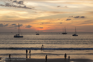 Sunset with yachts and catamarans at Nai Harn beach, Phuket, Thailand | by Phuketian.S
