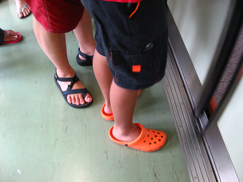 Orange Crocs | Kid with orange crocs, MRT | shimmertje | Flickr
