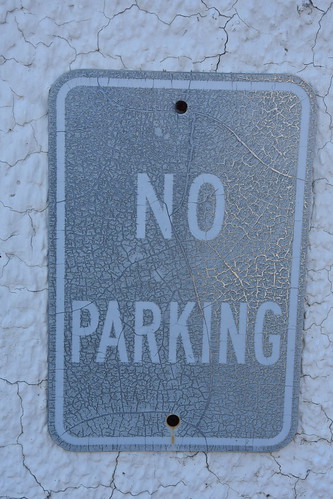noparking sign signs 2017 faded silver gray old cracked cracks