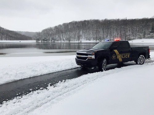 Photo of Natural Resources Police truck on patrol in snowy landscape