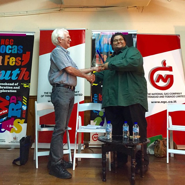 Angelo Bissessarsingh (R) receives a Citizens of Conservation award from Geoffrey McLean at Bocas Litfest South. #Trinidad