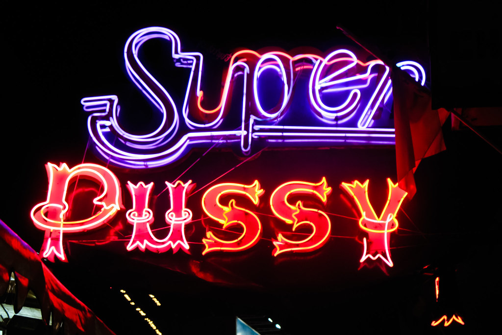 Super Pussy One Of The Weird Neon Signs On The Sex Show