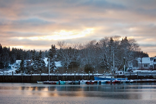 winter sunset snow boats harbor pier maine deerisle stonington