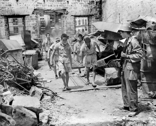 Working Japanese prisoners of war with American guard, Phi… | Flickr