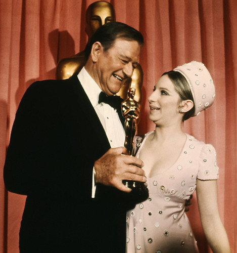 In this 1969 photo, US actor John Wayne accepts his Best Actor Oscar | by gem_106