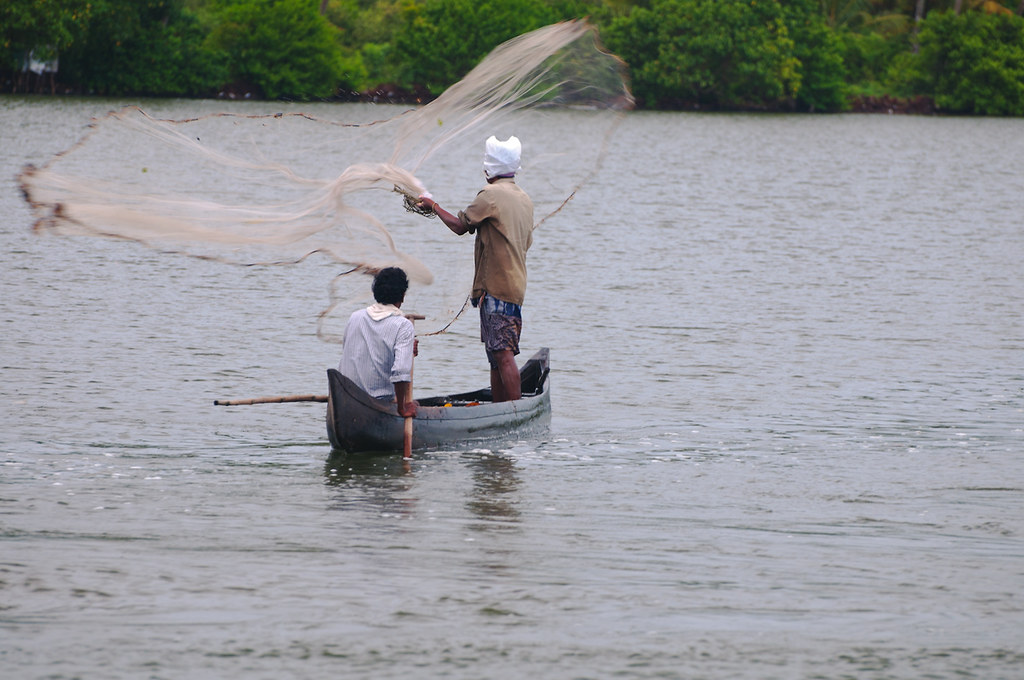 Fishing, Casting the typical Indian cast net in the backwat…