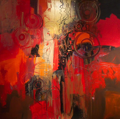 Vertical dark marks over red and orange