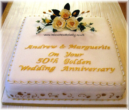 Golden anv square cake with sugar flower roses