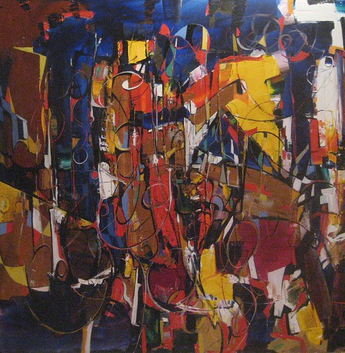 Clustered figure-like forms in red and gold