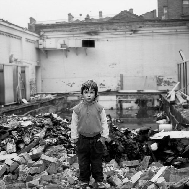 young boy in rubble 1986