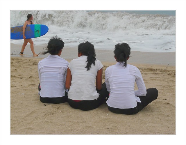 Three girls and the surfer .