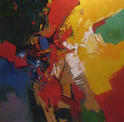 Broad orange, red and green patches with dark outlines