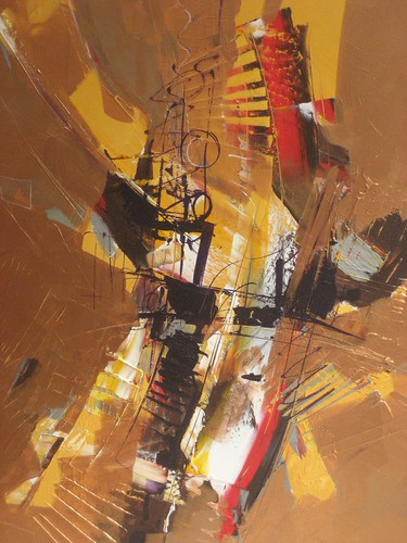 Angled golden and black forms with white highlights