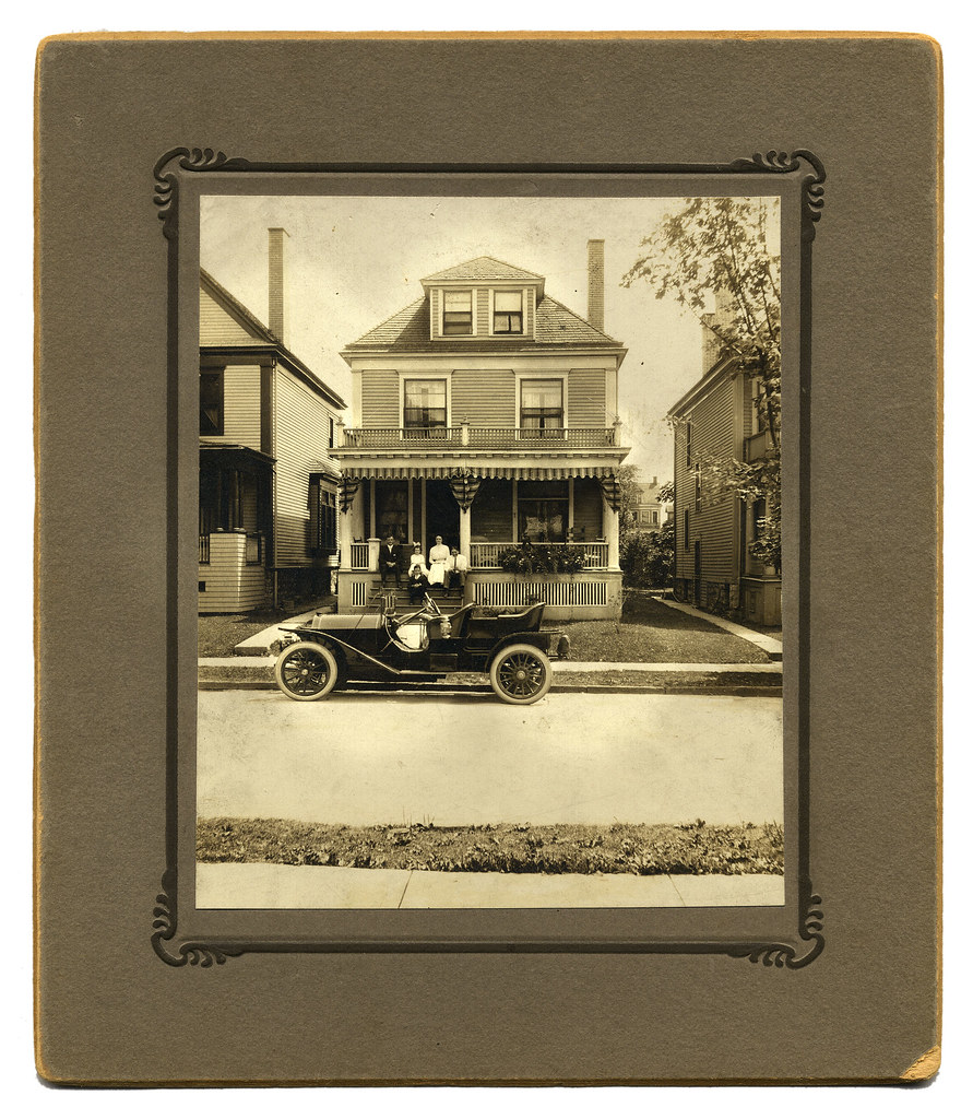Family with car and home, Buffalo, New York c1910