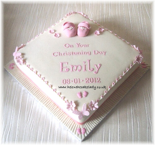girls christening square cake with booties