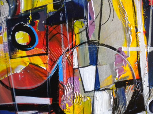 Large eye-like circle among angular red and yellow forms