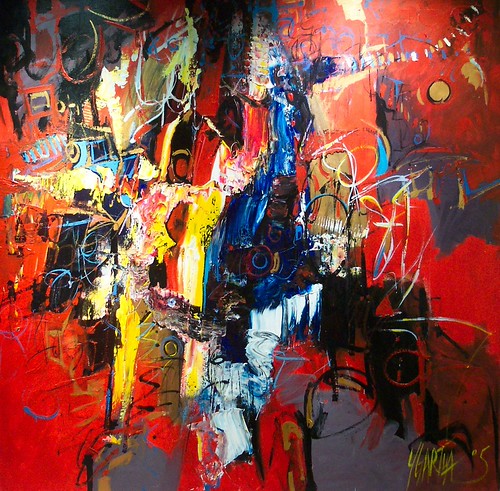 Black and white marks amid vivid red and blue