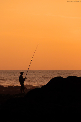 ocean africa sunset orange mer beach silhouette fishing fisherman ombre morocco maroc casablanca pêcheur plage coucherdesoleil rochers afrique pêche océan