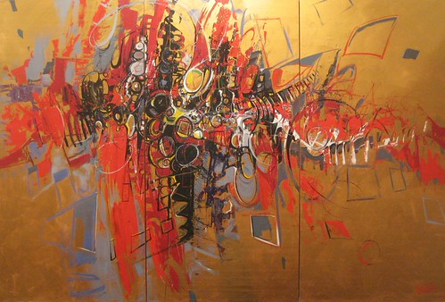 Fine outlined faces with red strokes on ochre