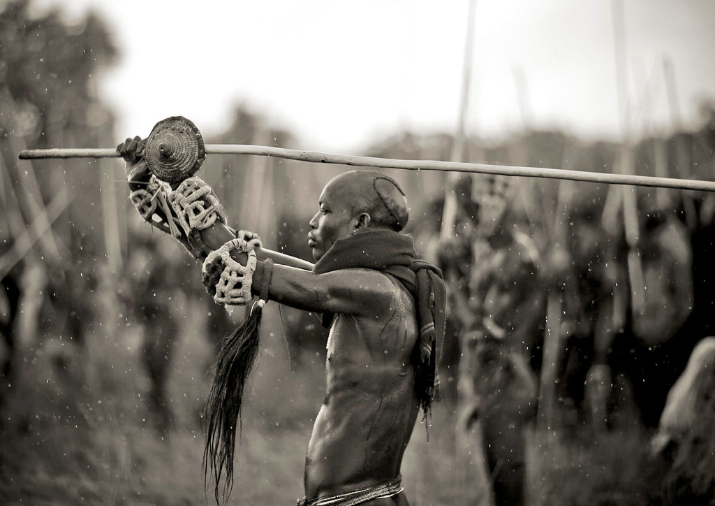 Donga stick fighting in Surma Suri under the rain - Ethiopia.
