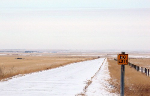 winter brown white snow grass fence openspace emptiness vastness noexit highway61 signroad prairiewinter