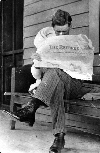 Overseer Jim Riley reading a newspaper on Isis Downs Station, 1915 by State Library of Queensland, Australia, <strong>Creator:</strong> Unidentified

<strong>Location:</strong> Isis Down Station, Queensland
 
<