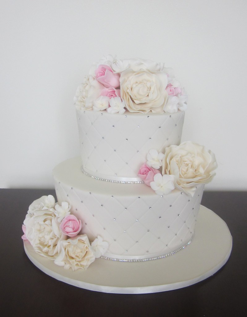 Pink, ivory, bling wedding cake