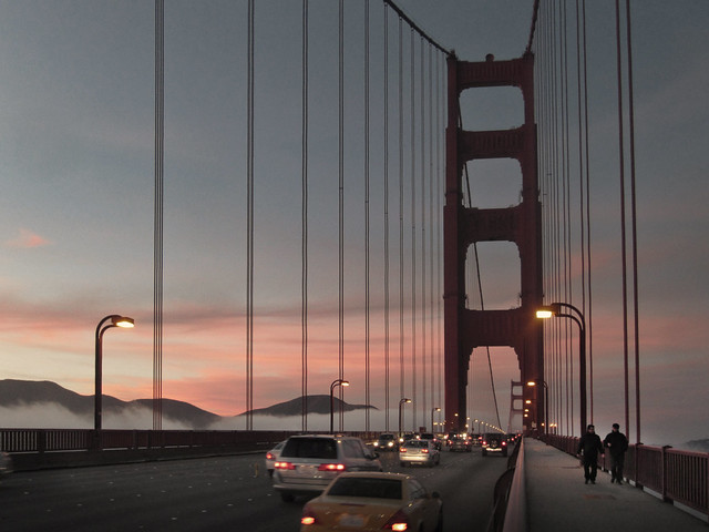 Walkers on the Golden Gate Bridge at sunset.  San Francisco (2012)