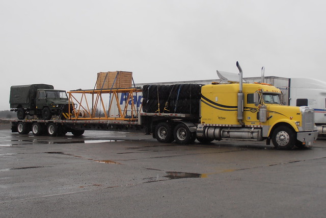 Nice yellow Freightliner truck & dropdeck trailer at truck stop in Arnprior, Ontario 04012012 ©Ian A. McCord