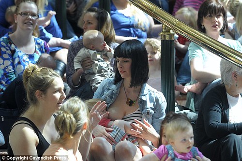 Flashmob. Hundreds of mothers and their infants descend on The Grand Staircase at The Trafford Centre in Manchester for National Breastfeeding Awareness Week 2011 - 2 | by BeautifulBreastfeeding