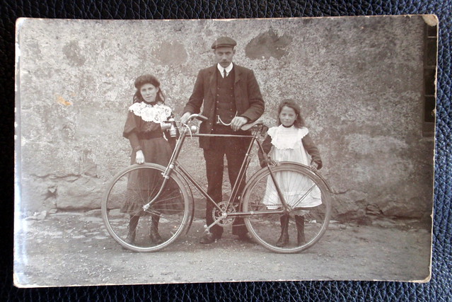 Cyclist with two Girls
