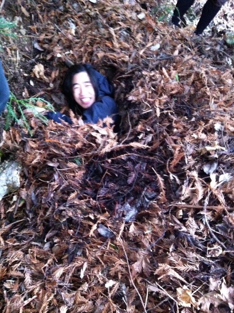 Stan in a debris hut