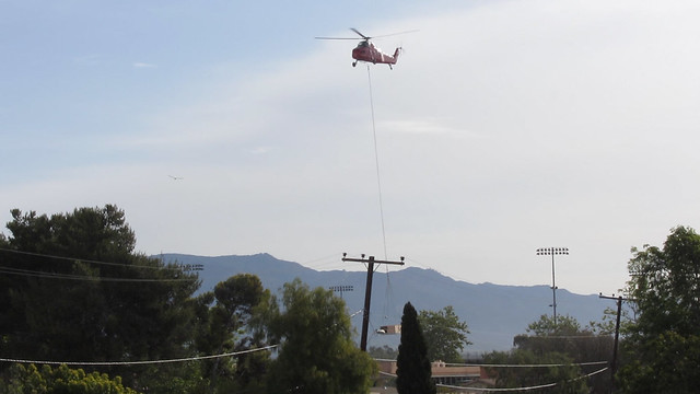 120328 helicopter lifting hvac unit over dos pueblos high school dphs fr mvi1728
