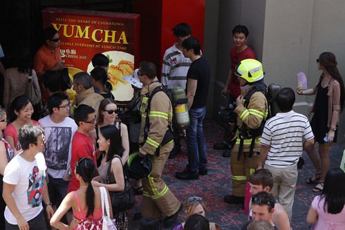 Firefighters checking out a false fire alarm in a restaurant