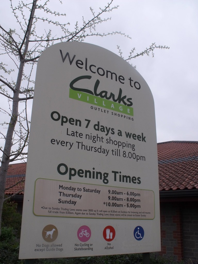 clarks village opening times saturday