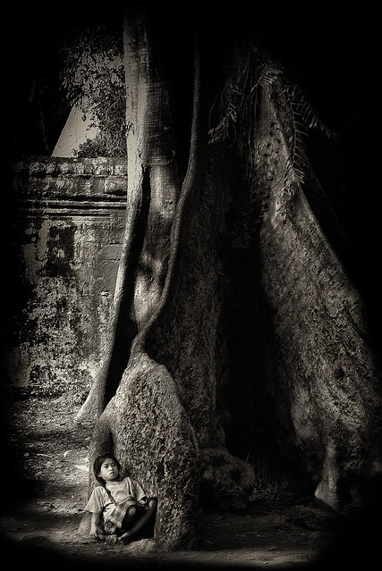 Siem Reap, Cambodia - A street girl taking a rest