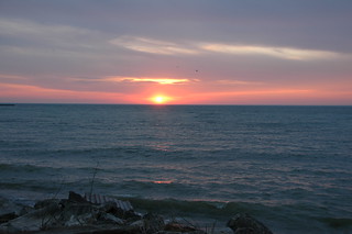 a pink and blue sky over lake erie