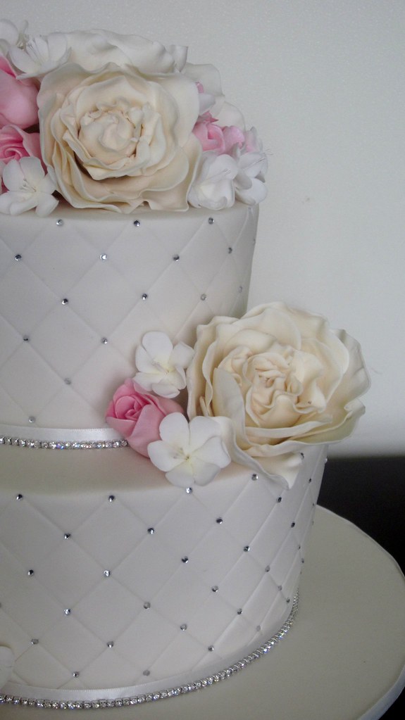 Pink, ivory, bling wedding cake