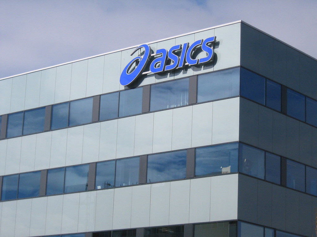 ASICS logo | Logo of sports brand ASICS on their offices at … | Flickr