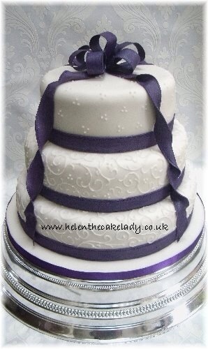 Cadbury purple ribbon 3 tier wedding cake