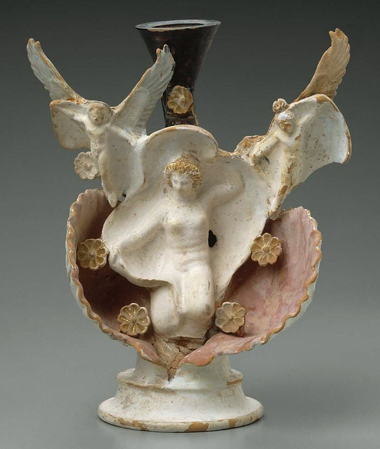Oil flask in the form of Aphrodite crouching in a scallop shell