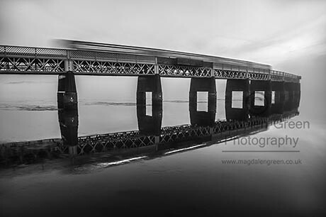Mean and Moody - Night Train Glides Over Tay Rail Bridge - Black and White - Dundee Scotland