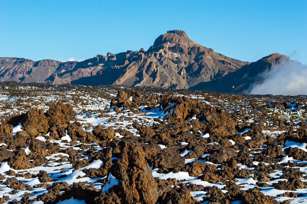 Lava and snow on the Teide national park. Lava y nieve en parque nacional del Teide. Tenerife