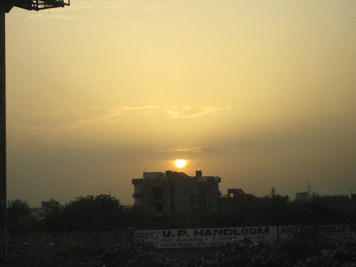 And to sum it up... by Ward-Mercer Family, The beautiful sunset over an appartment block...
...but just look at those piles of ribbish!!
I h