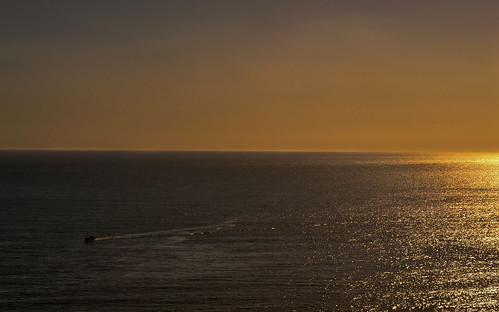 swansea swanseabay sea boat ship sun sunset sundown horizon wales southwales orange glow gold golden goldenhour bodyofwater ocean trail silhouette