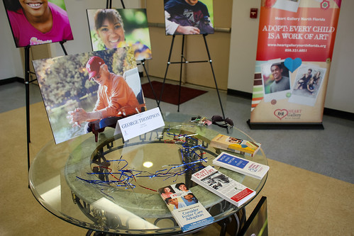 A memorial for volunteer George Thompson and brochures in the entrance at Guardian ad Litem Appreciation Day on May 12, 2012 in Tallahassee, Florida. | by flguardian2