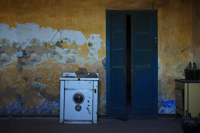 The deserted house with the old washing machine