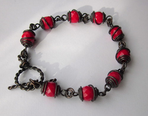 Serafina | Faceted Czech glass (actually a deep red) and cop… | Flickr